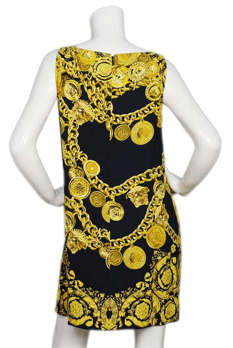 gold versace dress|Versace gold chain print dress.